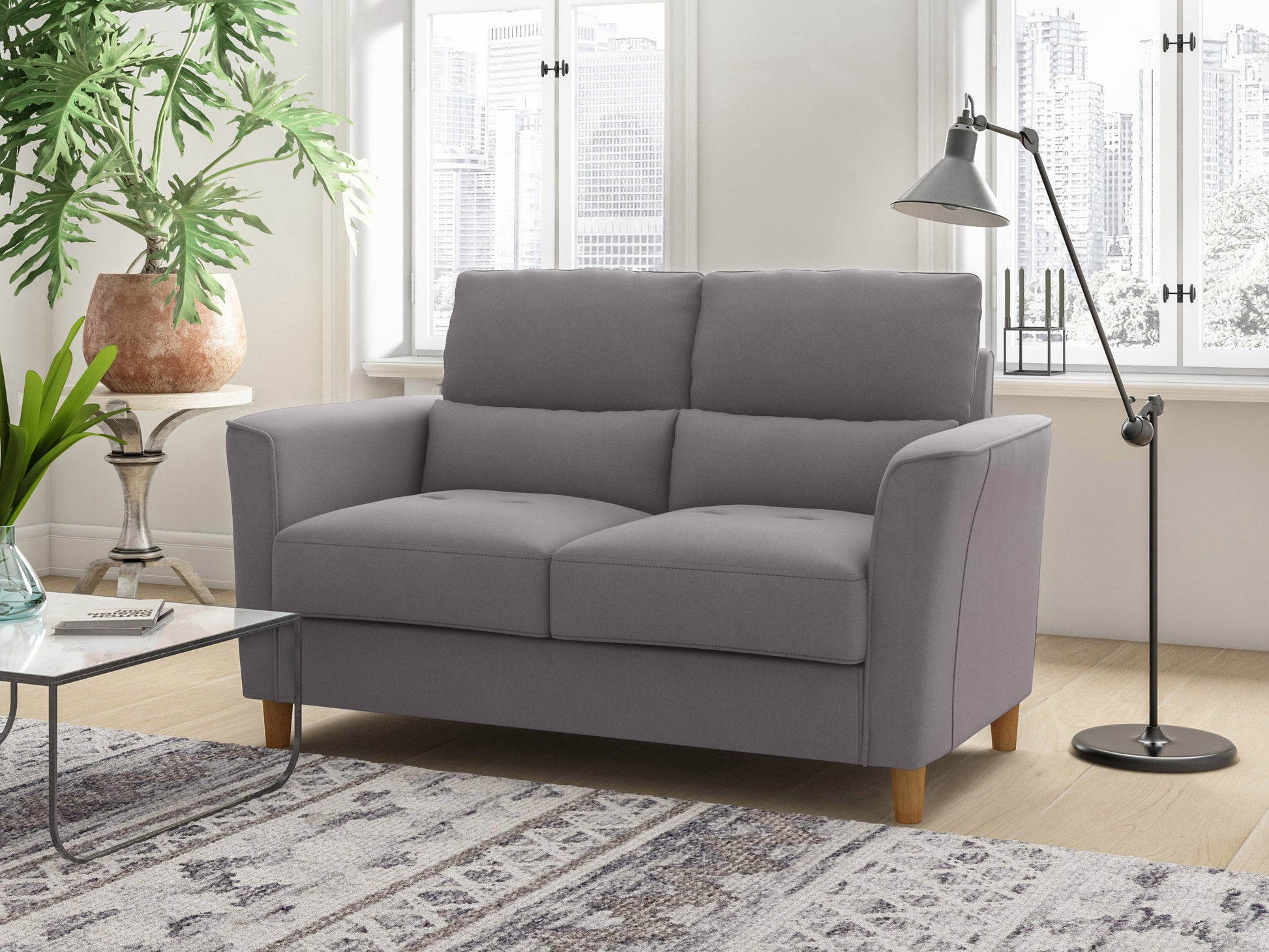 Mid-century modern gray loveseat with wooden legs, featuring tufted cushions and a sleek, minimalist design, perfect for contemporary living rooms and small spaces.