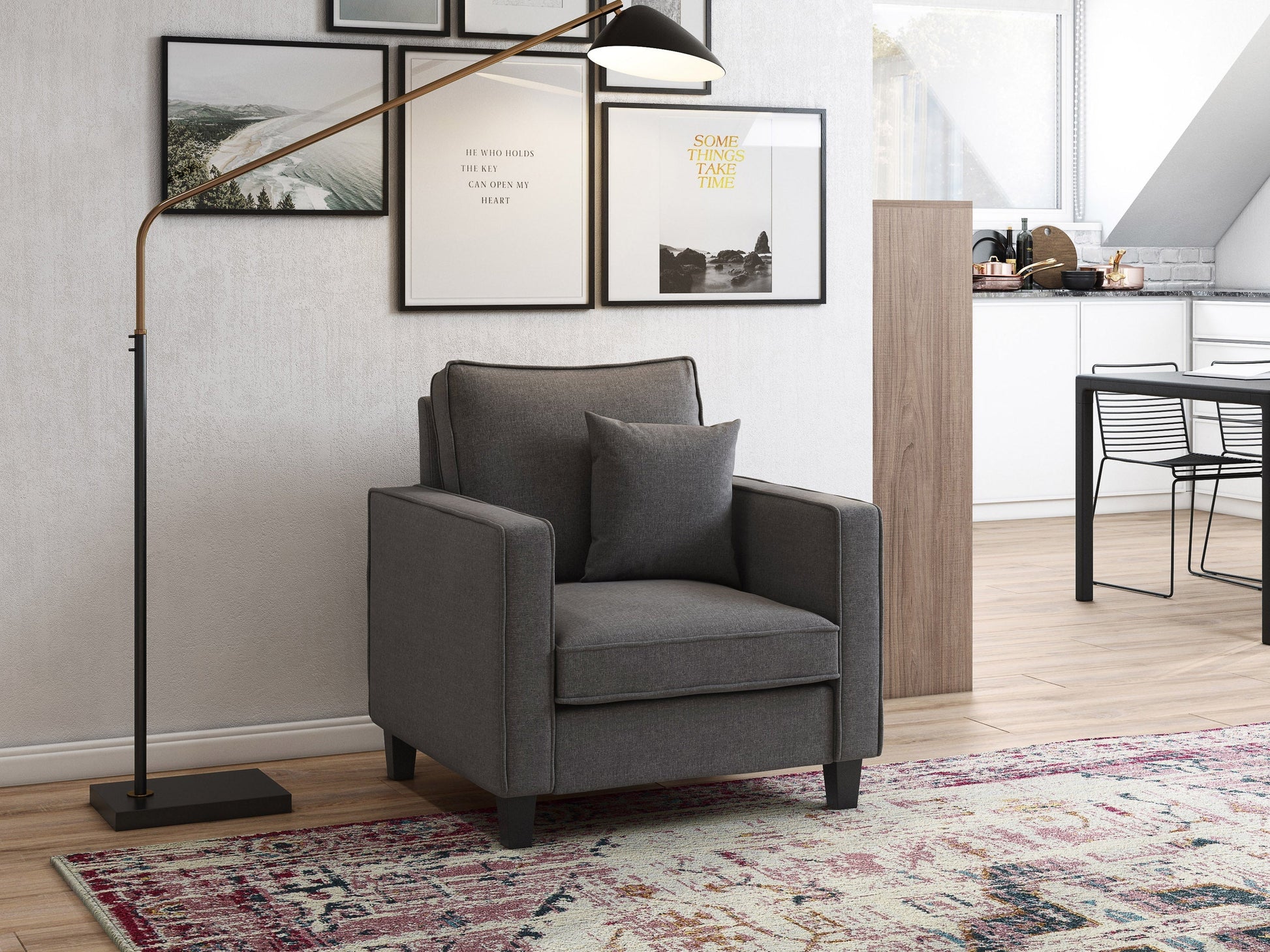 Mid-century modern grey armchair with wooden legs, tufted backrest, and sleek design.
