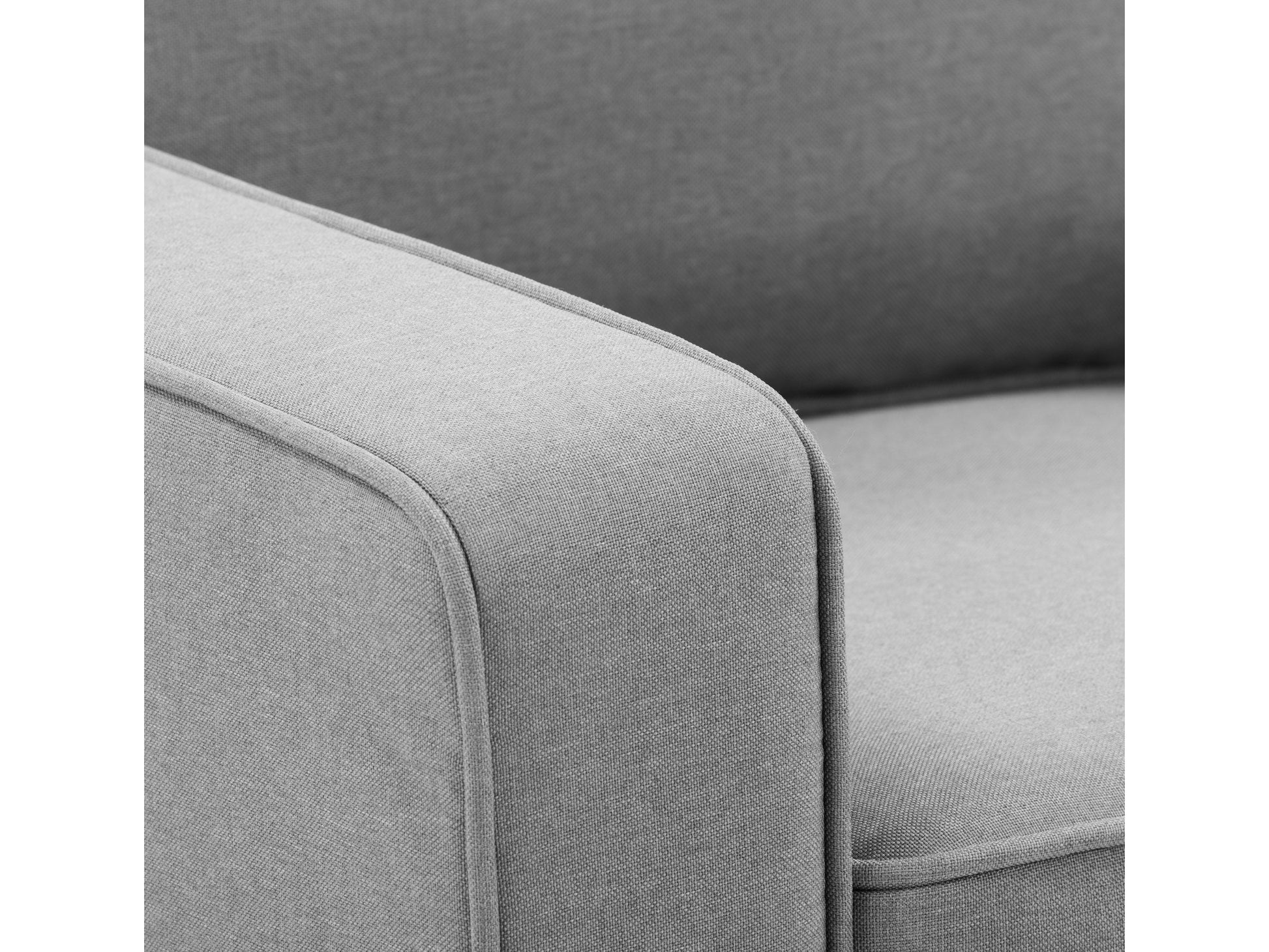 Compact dark grey loveseat with wooden legs, tufted backrest, and plush cushions for modern living spaces.