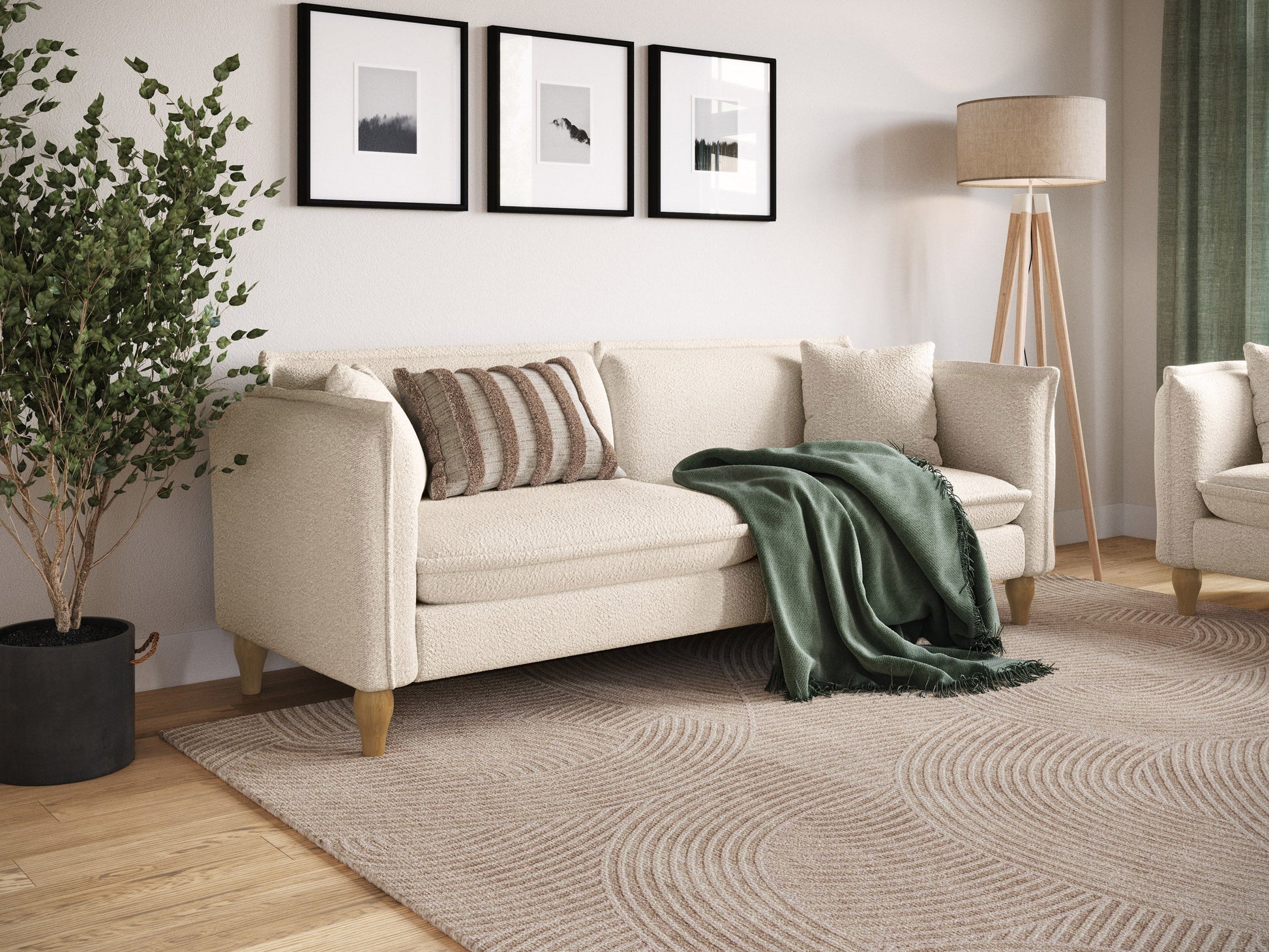 Boucle sofa with textured ivory fabric, sleek wooden legs, and minimalist design for modern living rooms.