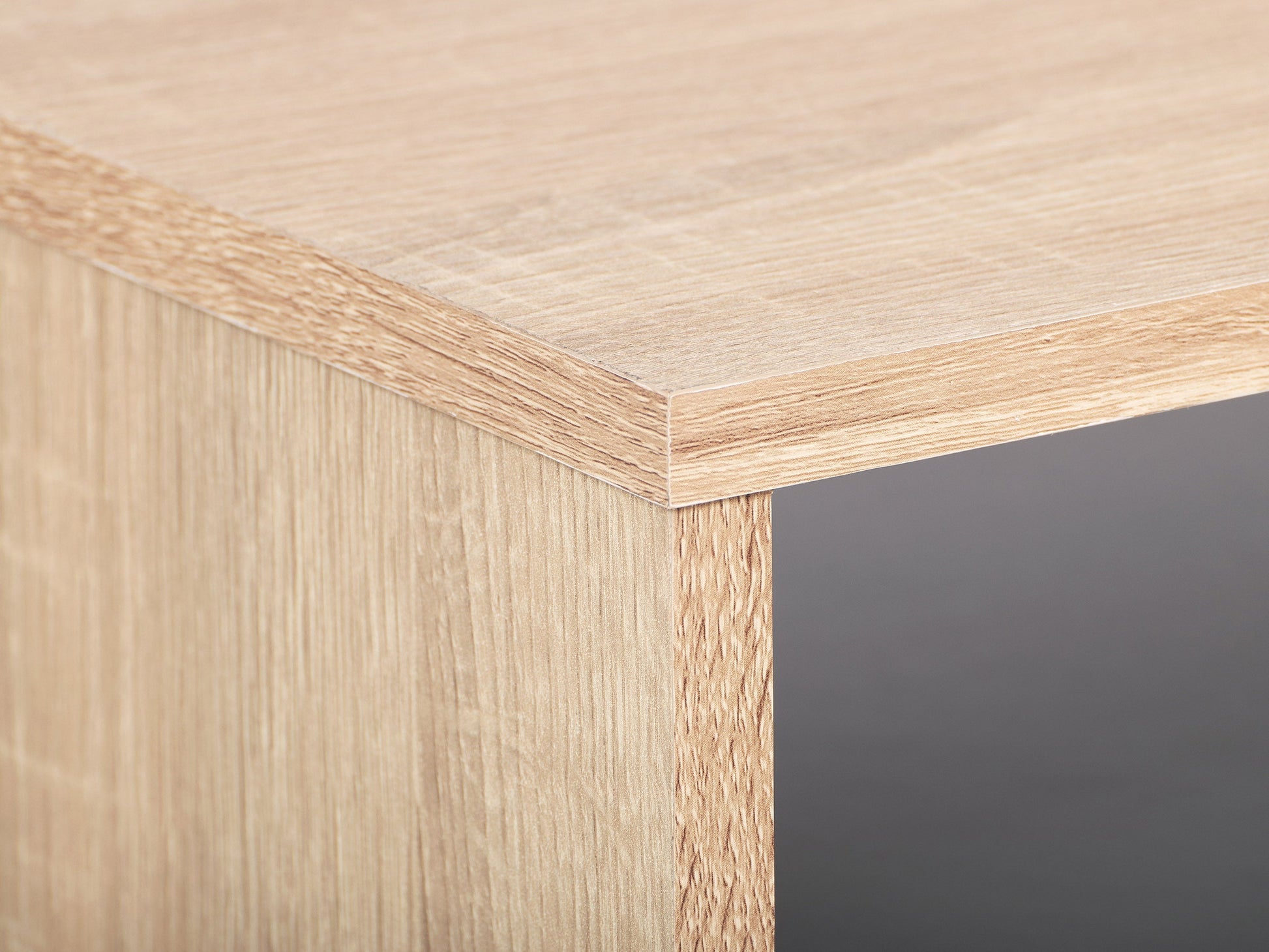 Light wood and grey coffee table with storage, rectangular design, modern minimalist style, sturdy construction.