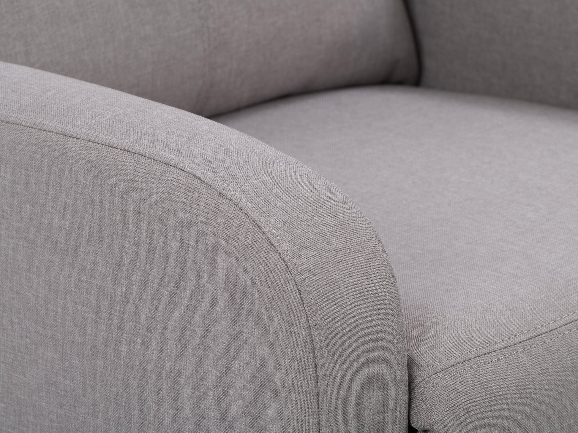 Light grey push back recliner with tufted fabric, wooden legs, and a modern design.