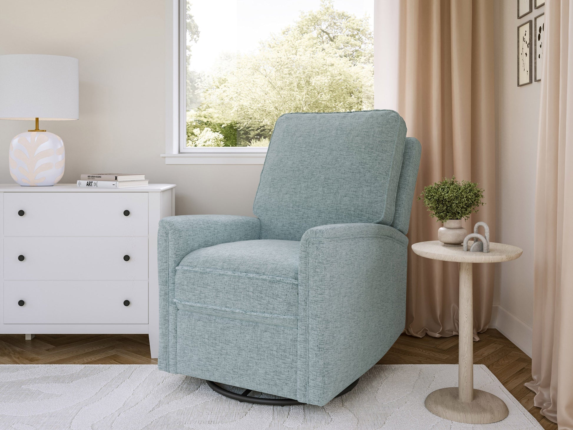 Blue swivel glider recliner chair with plush fabric, ergonomic design, and padded armrests for ultimate comfort.