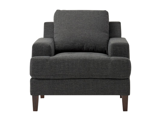 Mid Century dark grey fabric arm chair with wooden legs and tufted cushions.