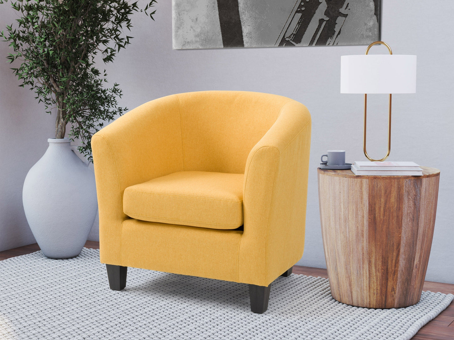 Yellow tub accent chair with plush upholstery, wooden legs, and a modern design for living rooms and offices.