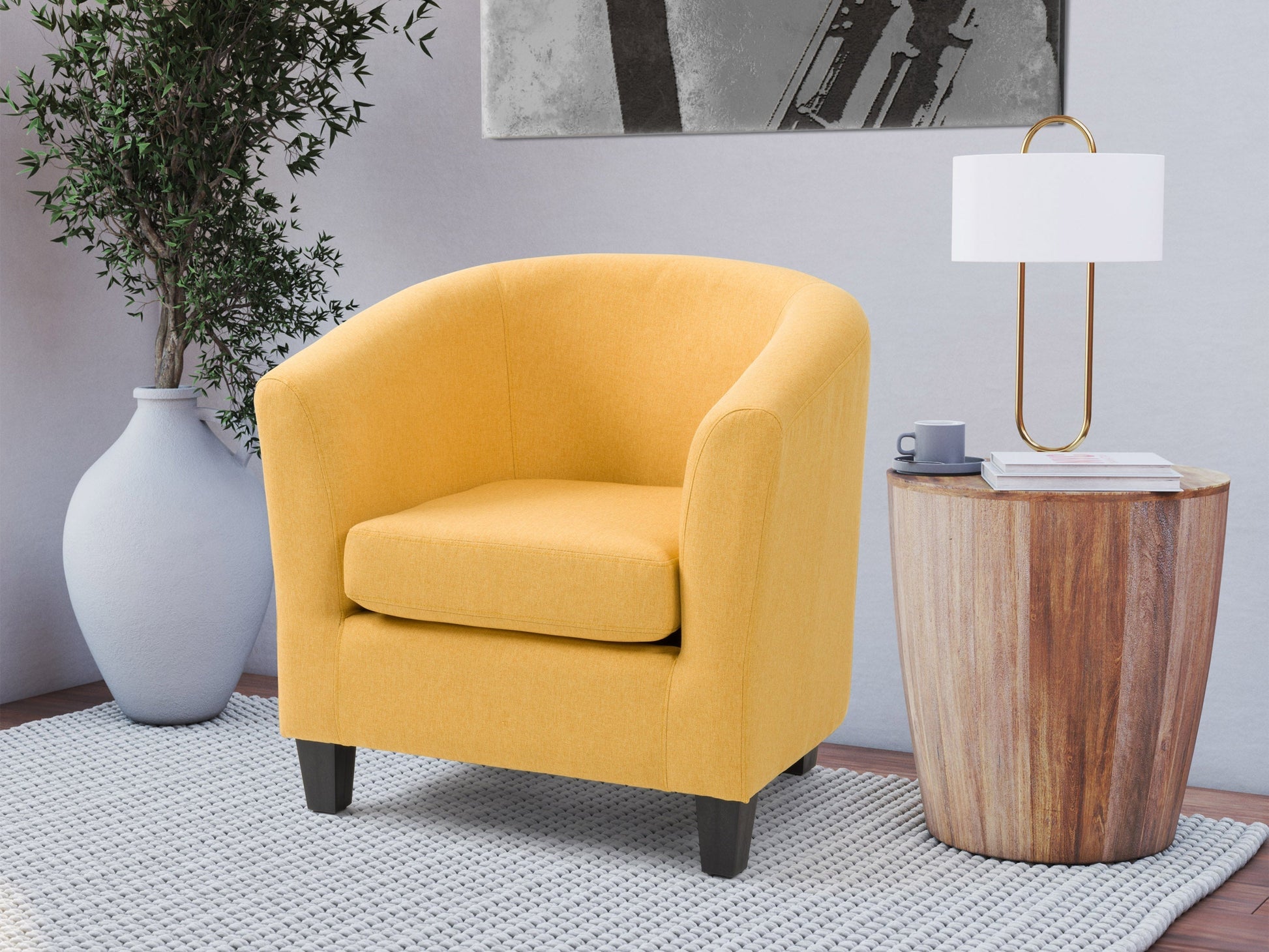 Yellow tub accent chair with plush upholstery, wooden legs, and a modern design for living rooms and offices.