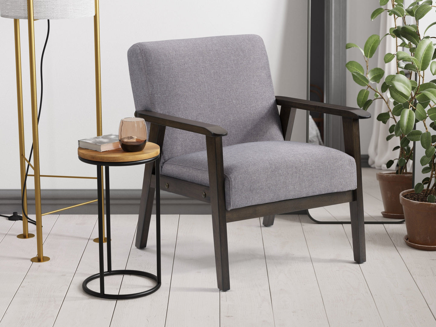Grey wood accent chair with cushioned seat and backrest, mid-century modern design, and sleek wooden legs.