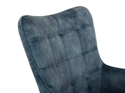 Dark teal velvet accent chair with matching stool, featuring tufted cushions and sleek wooden legs.