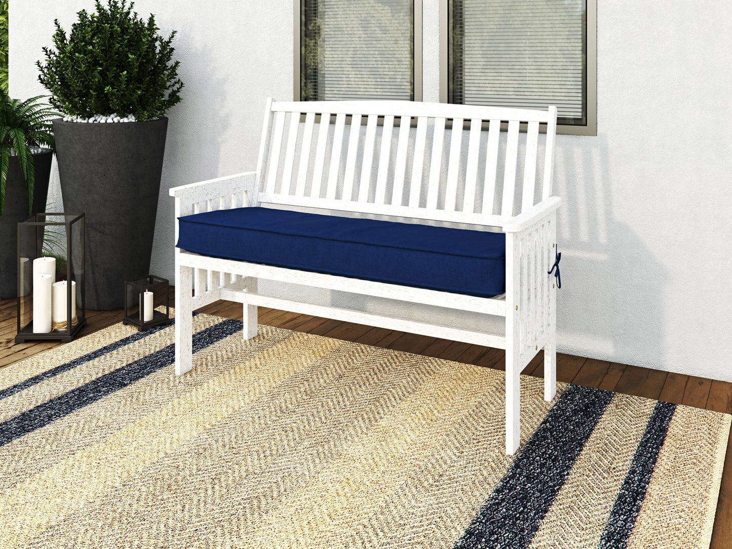 Washed white wood patio bench with backrest, slatted design, and sturdy construction for outdoor seating.