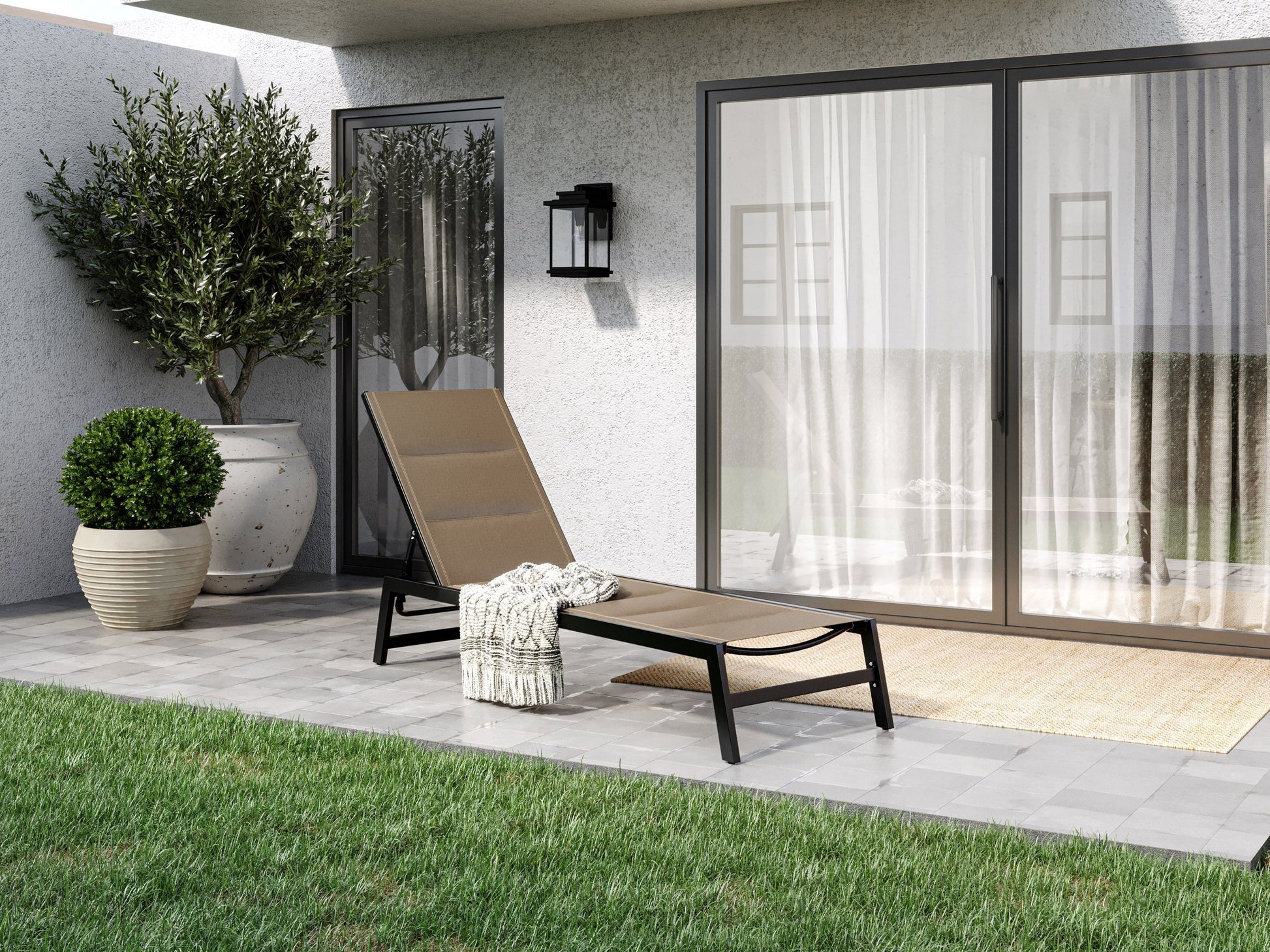 Taupe reclining patio lounge chair with cushion, featuring weather-resistant fabric and adjustable backrest.