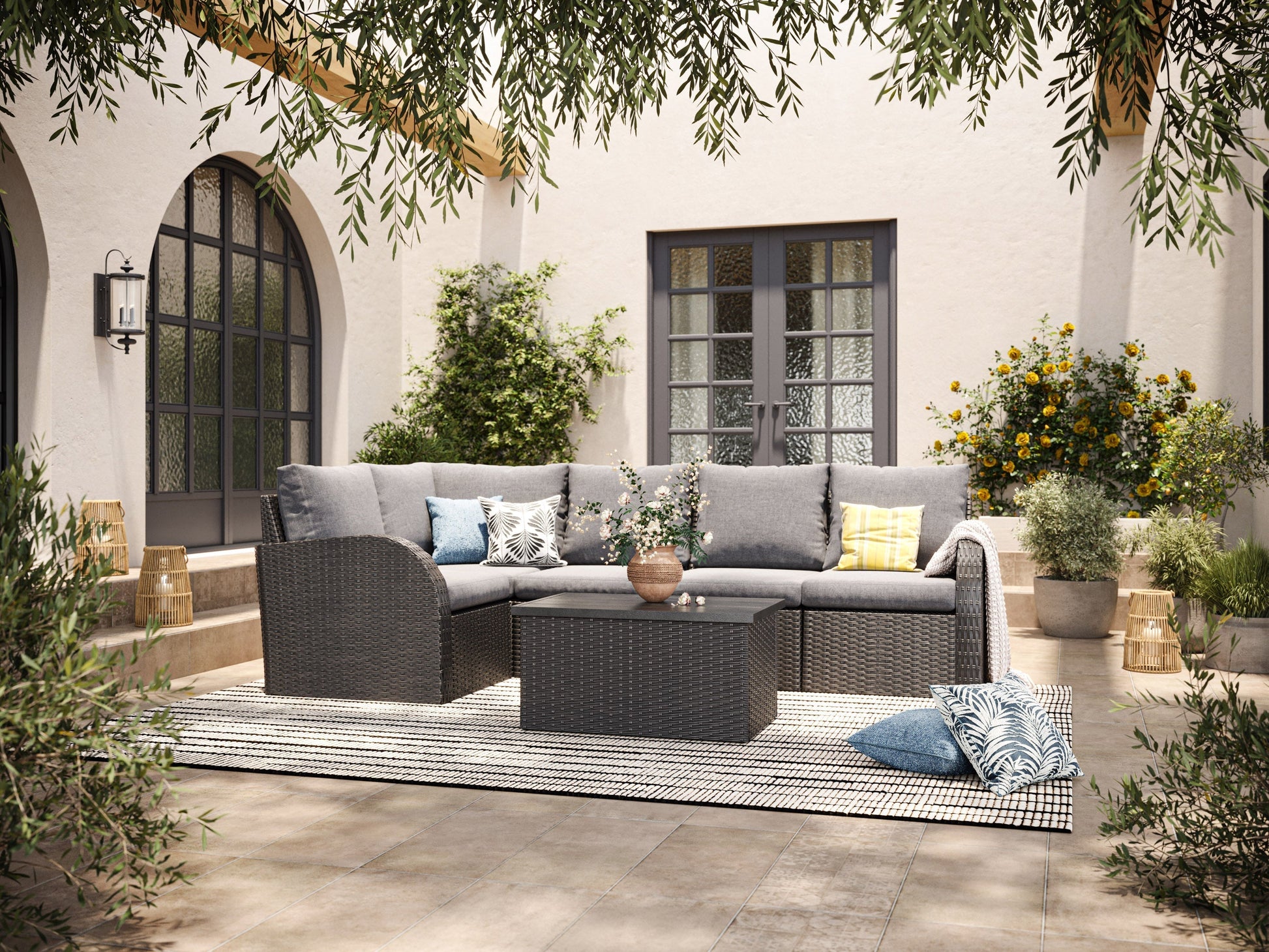 Grey outdoor wicker sectional set, 6-piece patio furniture with cushions and modular design.