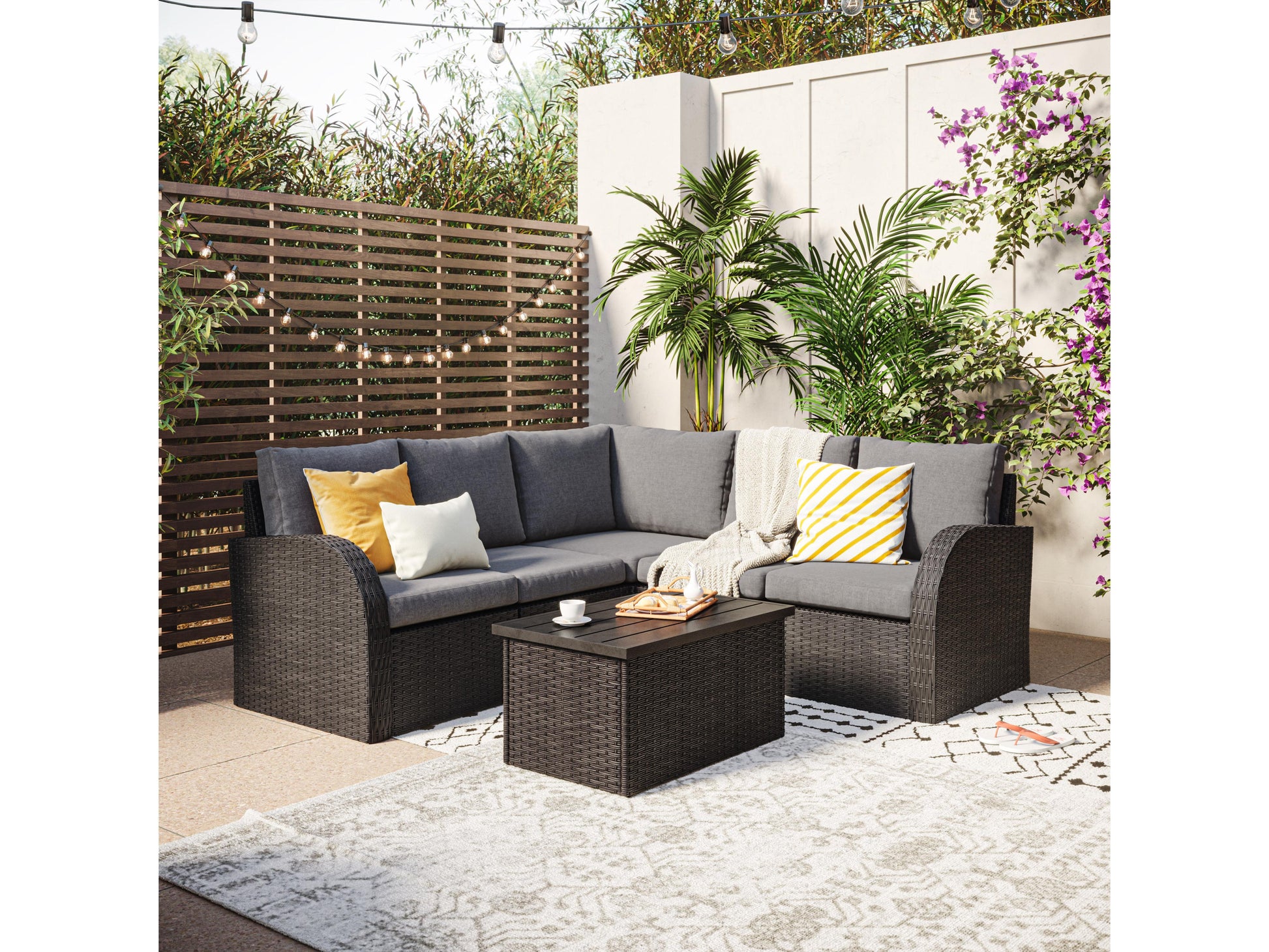 Grey outdoor wicker sectional set with cushions, 6-piece patio furniture, modern design, weather-resistant.