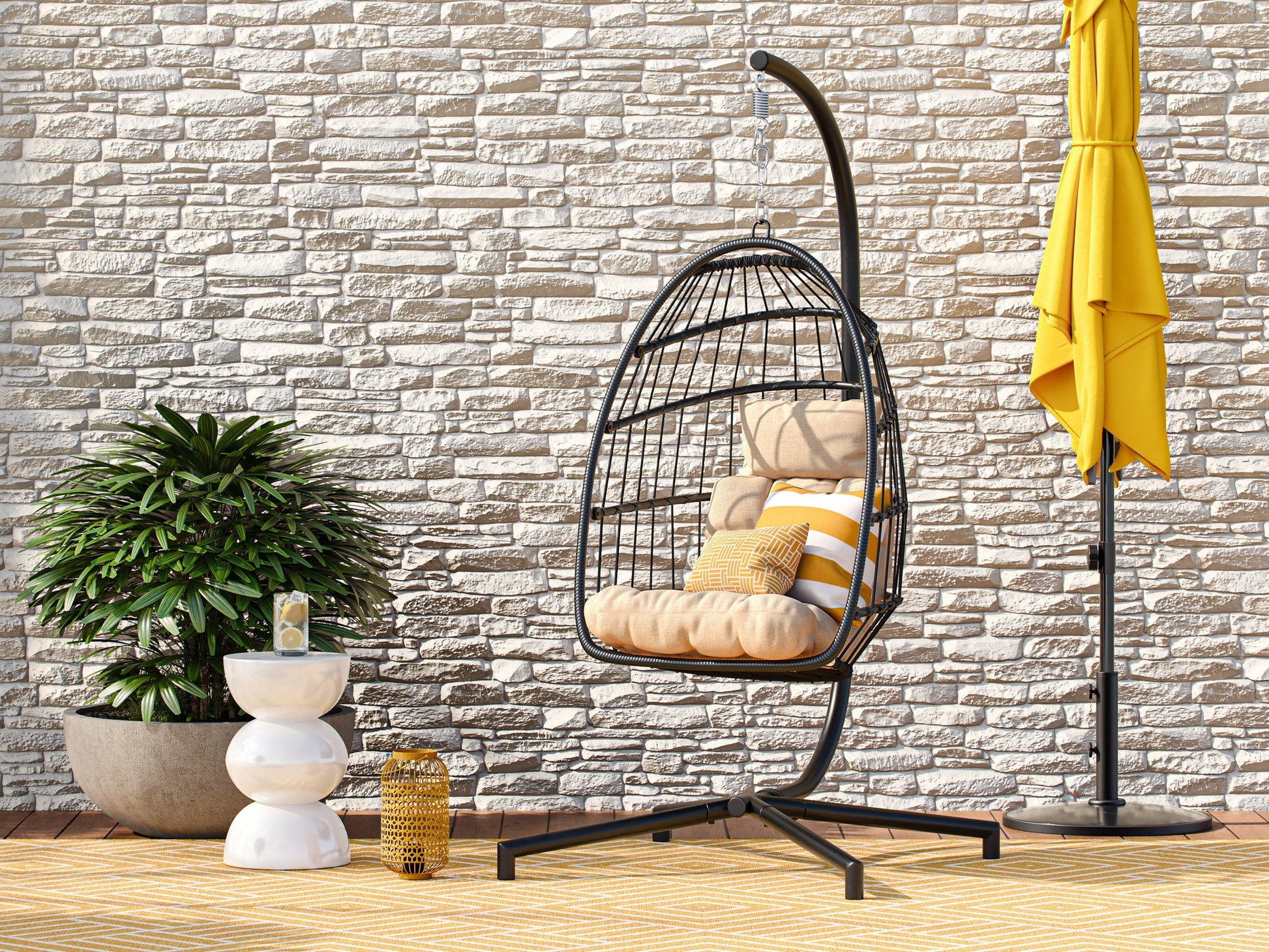 Beige hanging egg chair with cushions, wicker design, and sturdy metal stand for patio or garden relaxation.