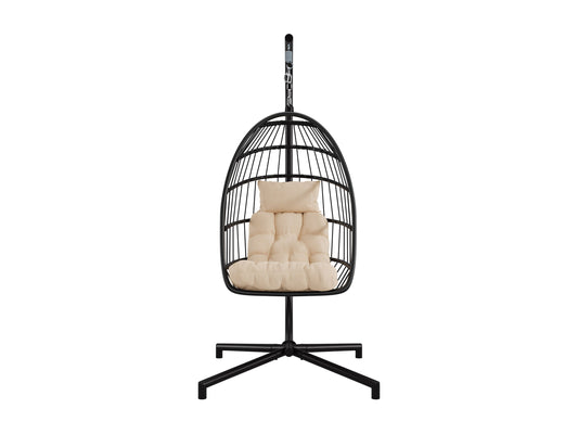 Beige hanging egg chair with cushion, wicker design, and sturdy metal stand for patio use.