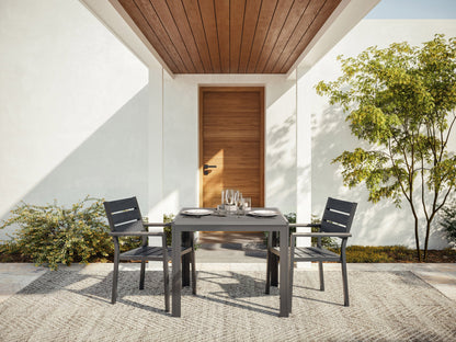 Square outdoor dining table with a grey metal frame and slatted wooden top, perfect for patio or garden settings.