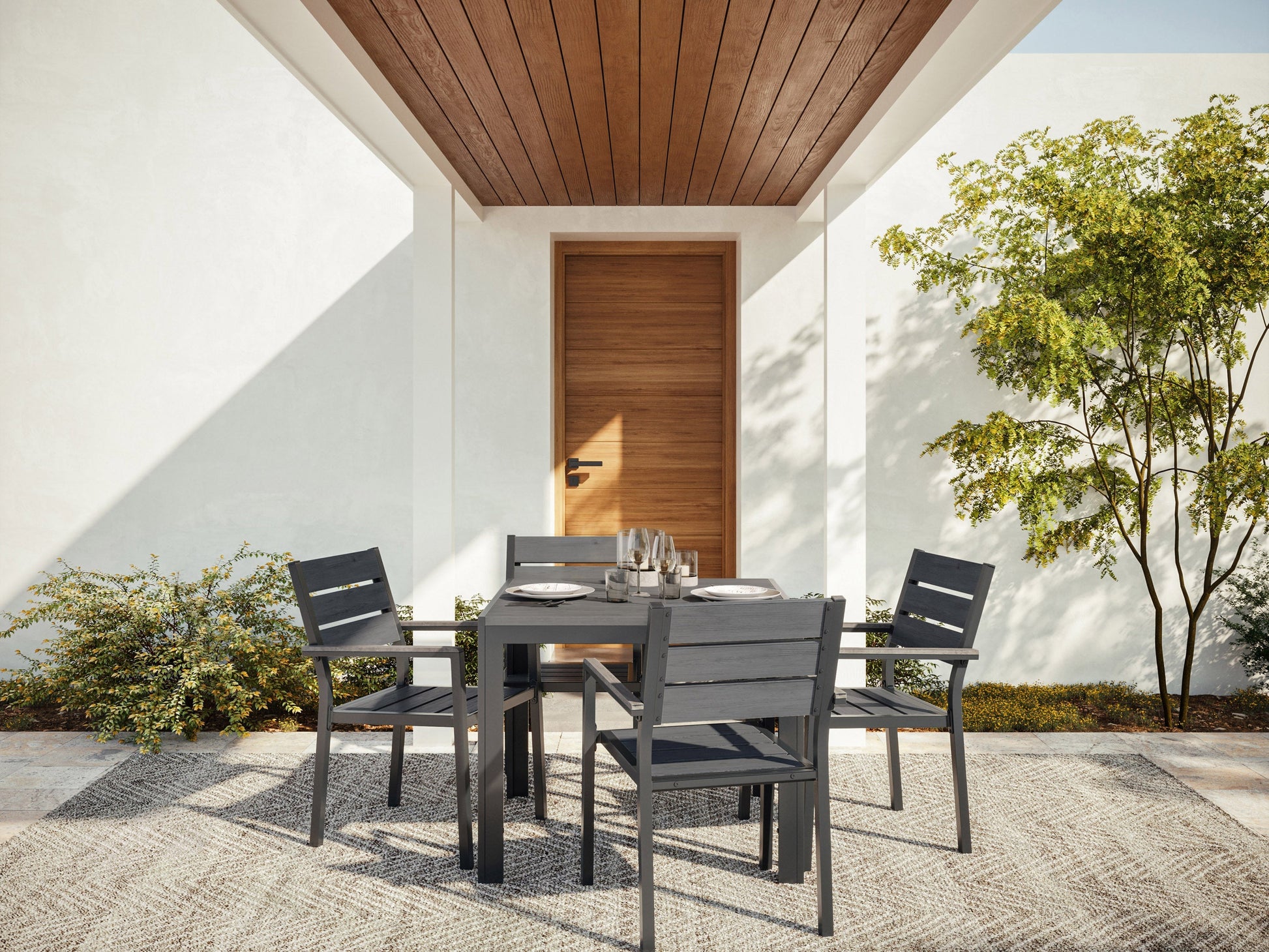 5pc outdoor dining set with grey cushioned chairs and rectangular wooden table, perfect for patio or garden use
