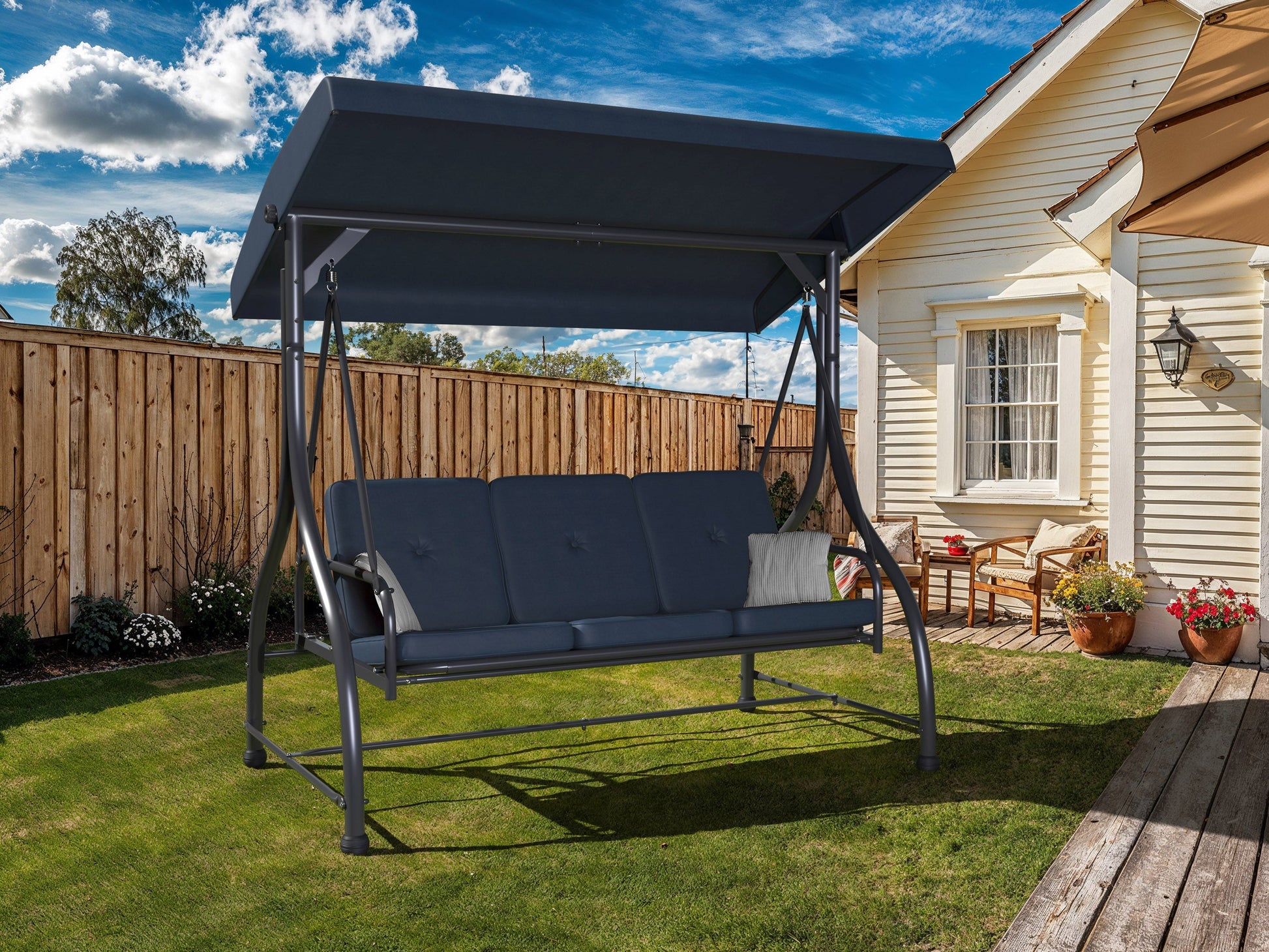 2-in-1 patio swing with canopy, grey cushioned seats, adjustable sunshade, and durable metal frame