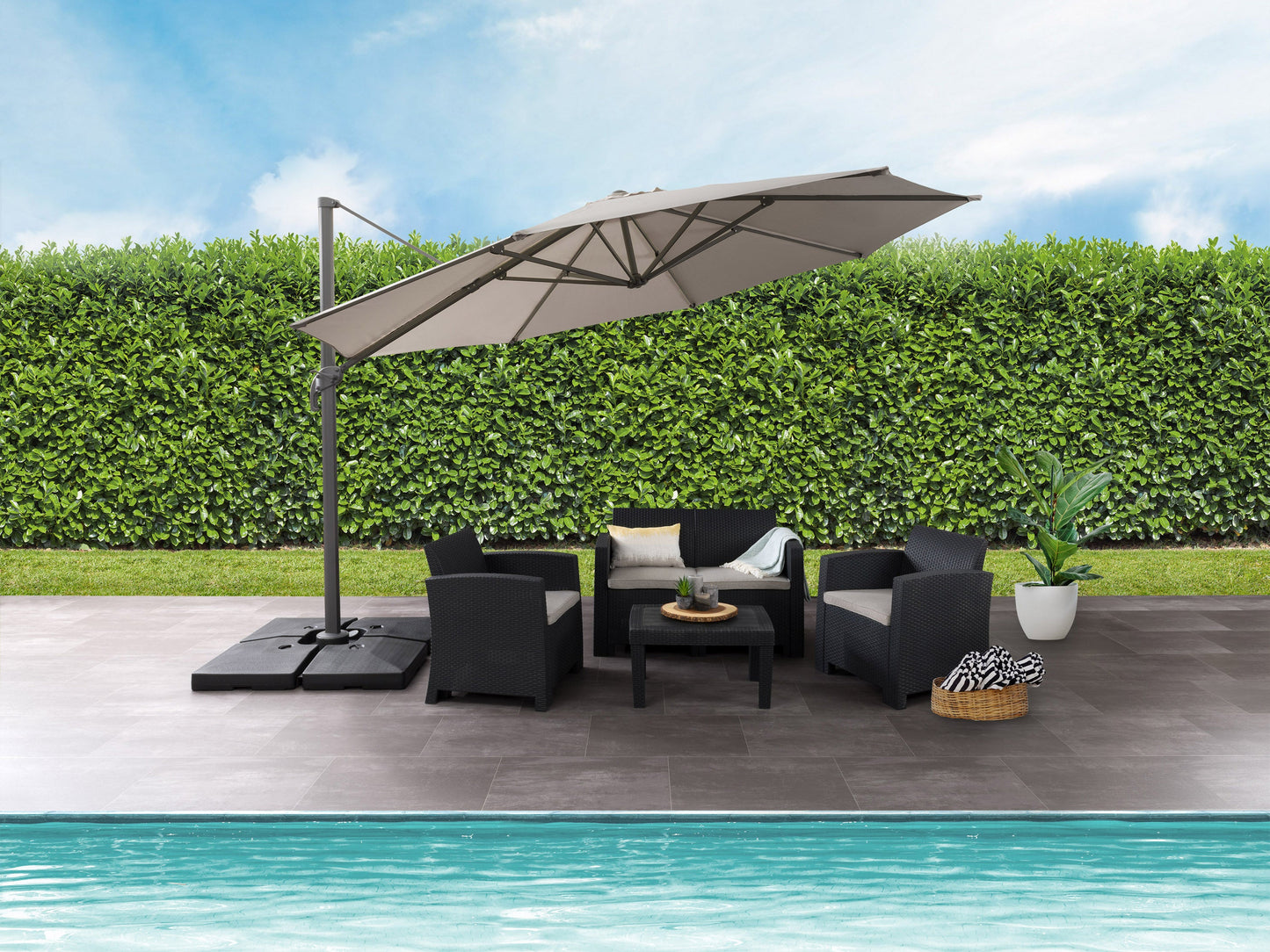 Beige 11.5ft deluxe offset patio umbrella canopy replacement with UV protection, water-resistant fabric, and vented top for optimal airflow. Ideal for outdoor settings, providing shade and durability.
