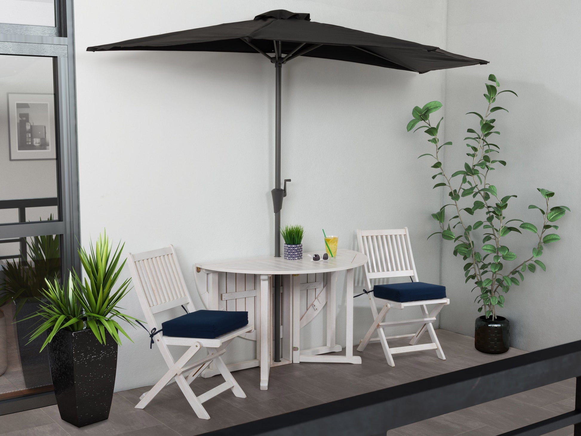 Black half umbrella with 8.5ft canopy, durable fabric, and sturdy metal frame for compact outdoor spaces.