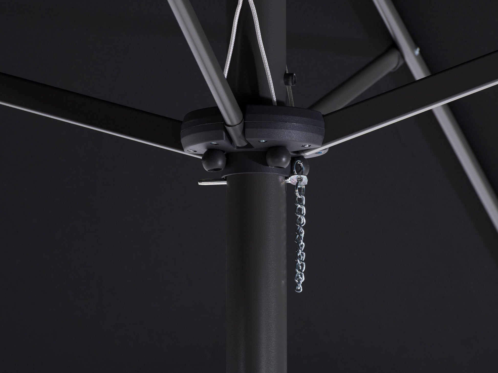 Black 15ft double patio umbrella with UV protection, sturdy metal frame, and crank lift system for outdoor shade.
