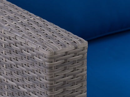 Wicker armchair with natural brown woven texture and white cushioned seat, featuring sturdy wooden legs. Ideal for patio or outdoor seating, blending rustic charm with modern comfort.
