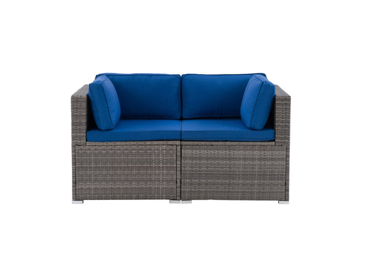 Modern patio chair with gray cushioned seat and backrest, featuring a sleek black metal frame and armrests, perfect for outdoor lounging.