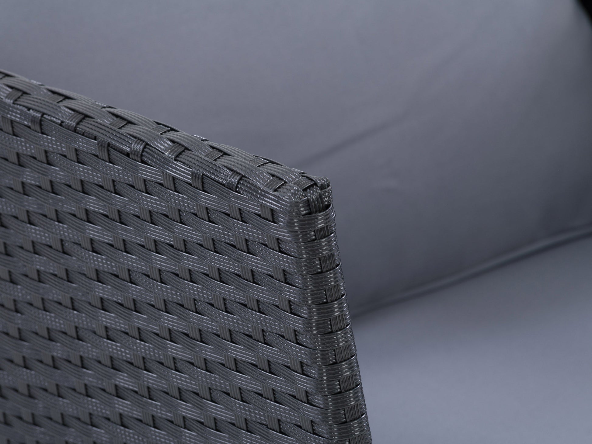 Black and grey L shaped outdoor sectional, 8-piece set with weather-resistant cushions and sleek aluminum frame.