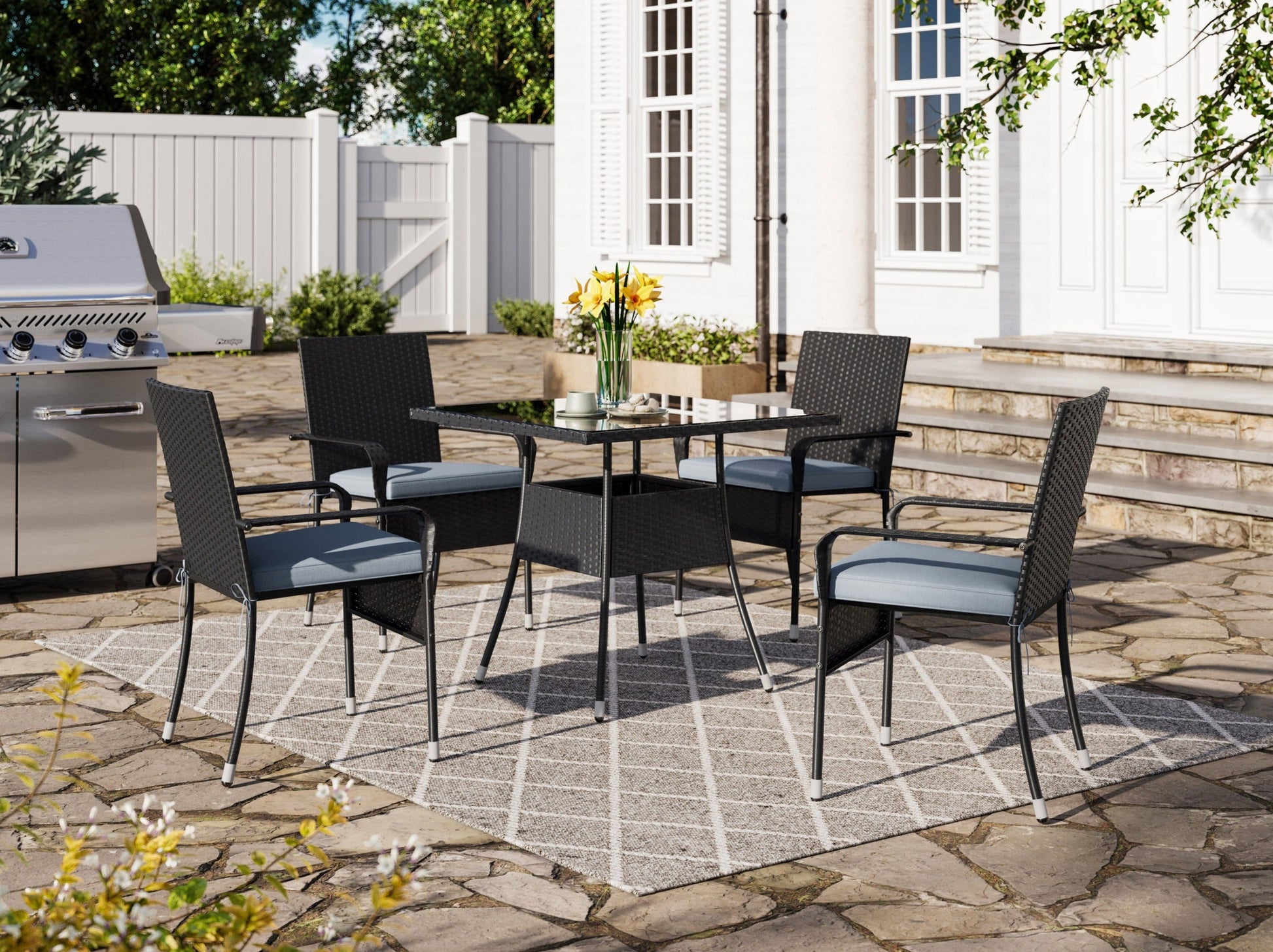 5-piece patio dining set with grey cushions, black metal frame, and wooden accents, perfect for outdoor gatherings