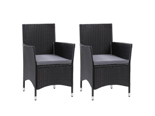 Set of 2 wicker armchairs with beige cushions, featuring a sturdy metal frame and woven rattan texture, ideal for outdoor patio seating.