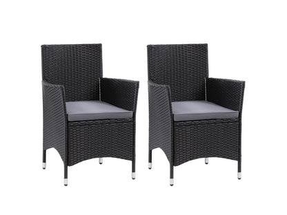 7-piece patio dining set with grey cushioned chairs, rectangular wooden table, and black metal frame.