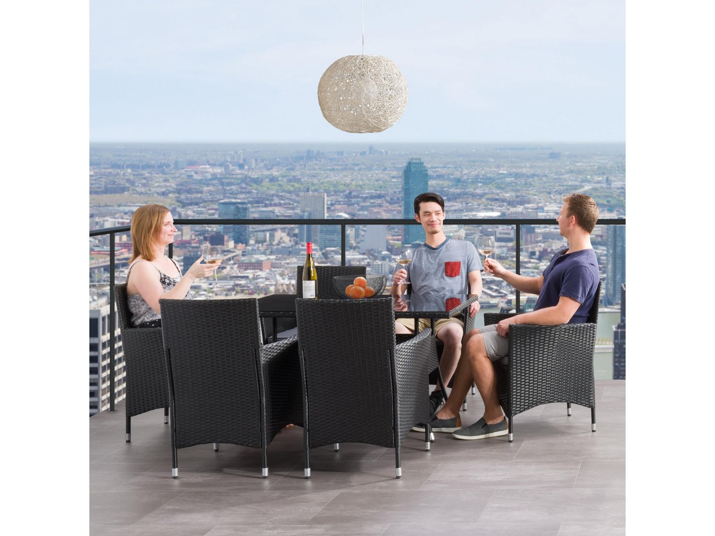 7pc patio dining set with grey cushions, black metal frame, and rectangular table, perfect for outdoor dining.