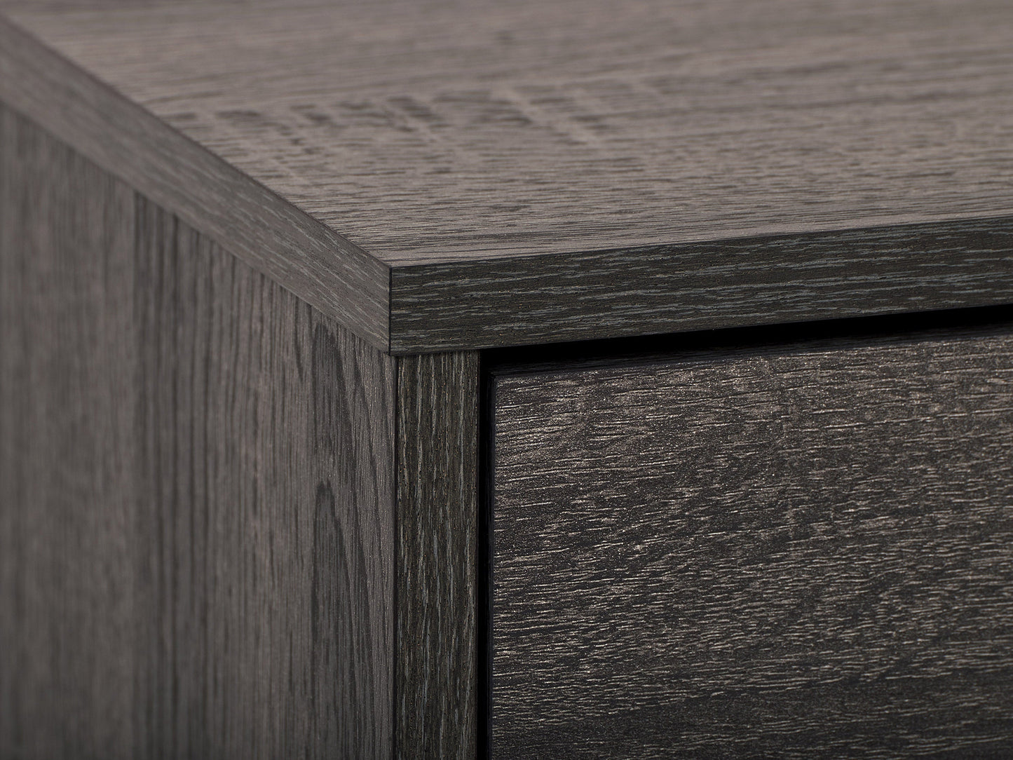 Dark grey TV stand with cabinet storage, fits TVs up to 85 inches, sleek design, sturdy construction.