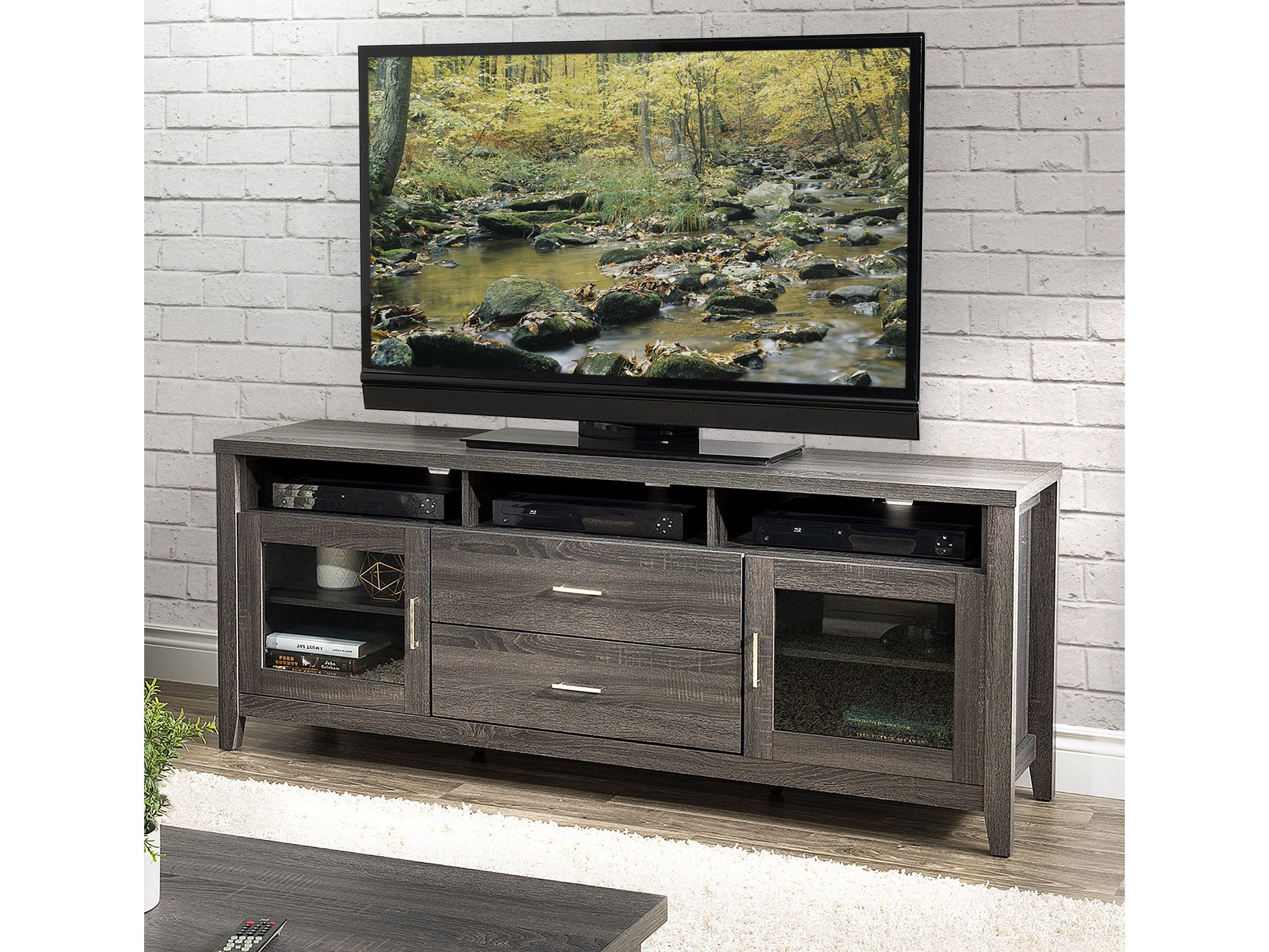 Modern TV stand for up to 85" TVs, featuring a sleek black finish, two spacious drawers, open shelving for media devices, and a sturdy wooden construction with a minimalist design.
