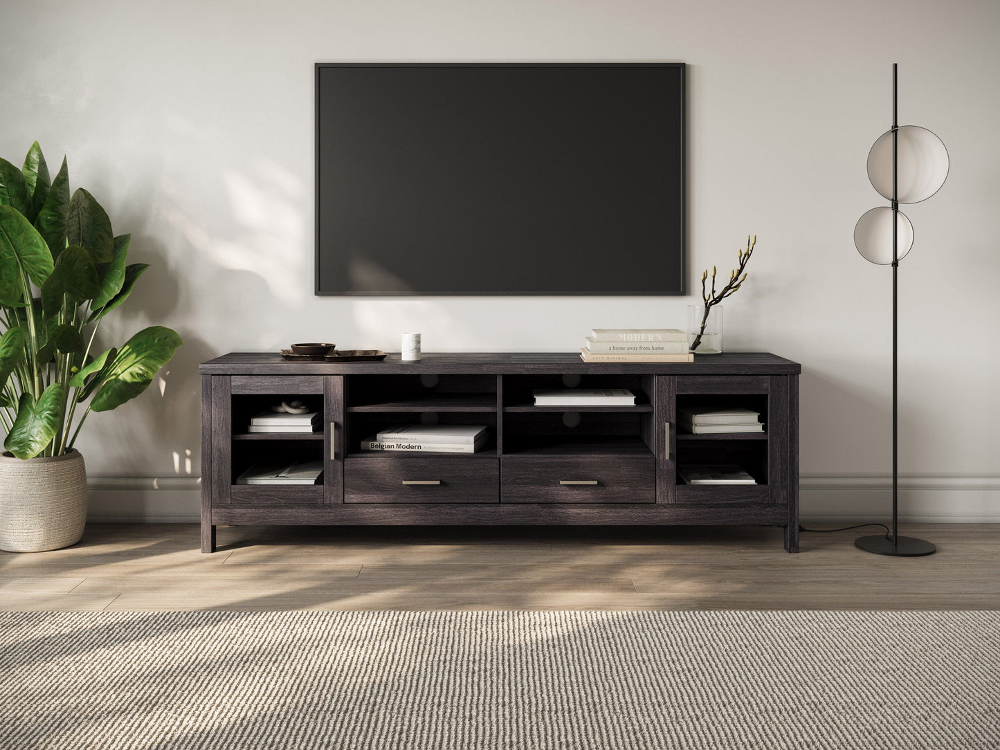Modern wooden TV stand with a walnut finish, featuring sleek black metal legs, two open shelves, and two sliding doors for storage. Ideal for contemporary living rooms or entertainment spaces.