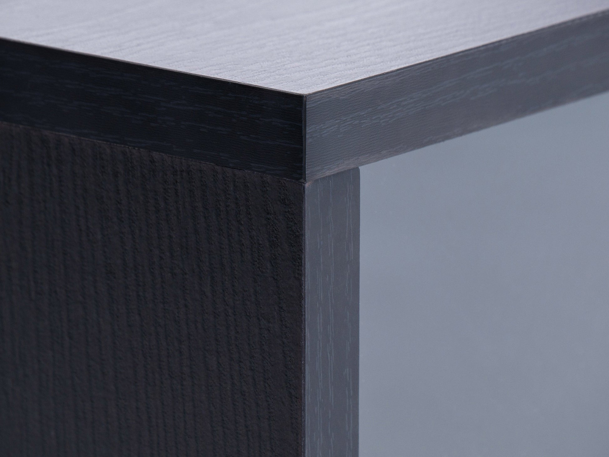 Modular TV stand for 55" TVs, dark wood finish, adjustable shelves, and sleek metal legs.