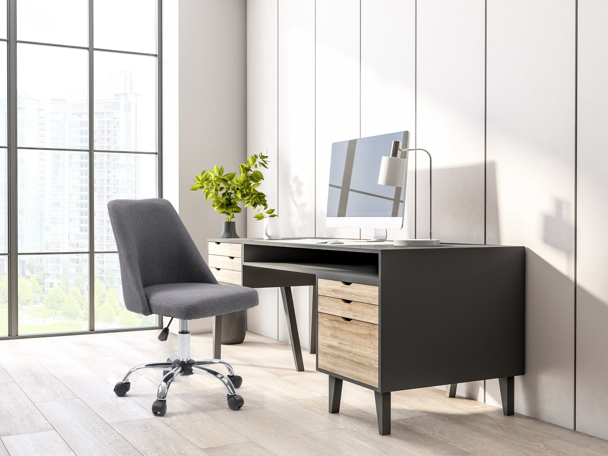Dark grey armless task chair with ergonomic design, mesh backrest, and adjustable height for office use.
