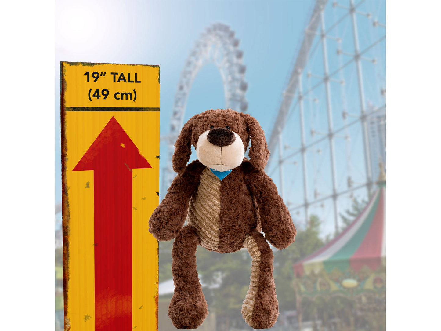 Plush dog toy with soft, light brown fur, floppy ears, and a blue collar; designed as a charity plush named Reggie, perfect for children and dog lovers.