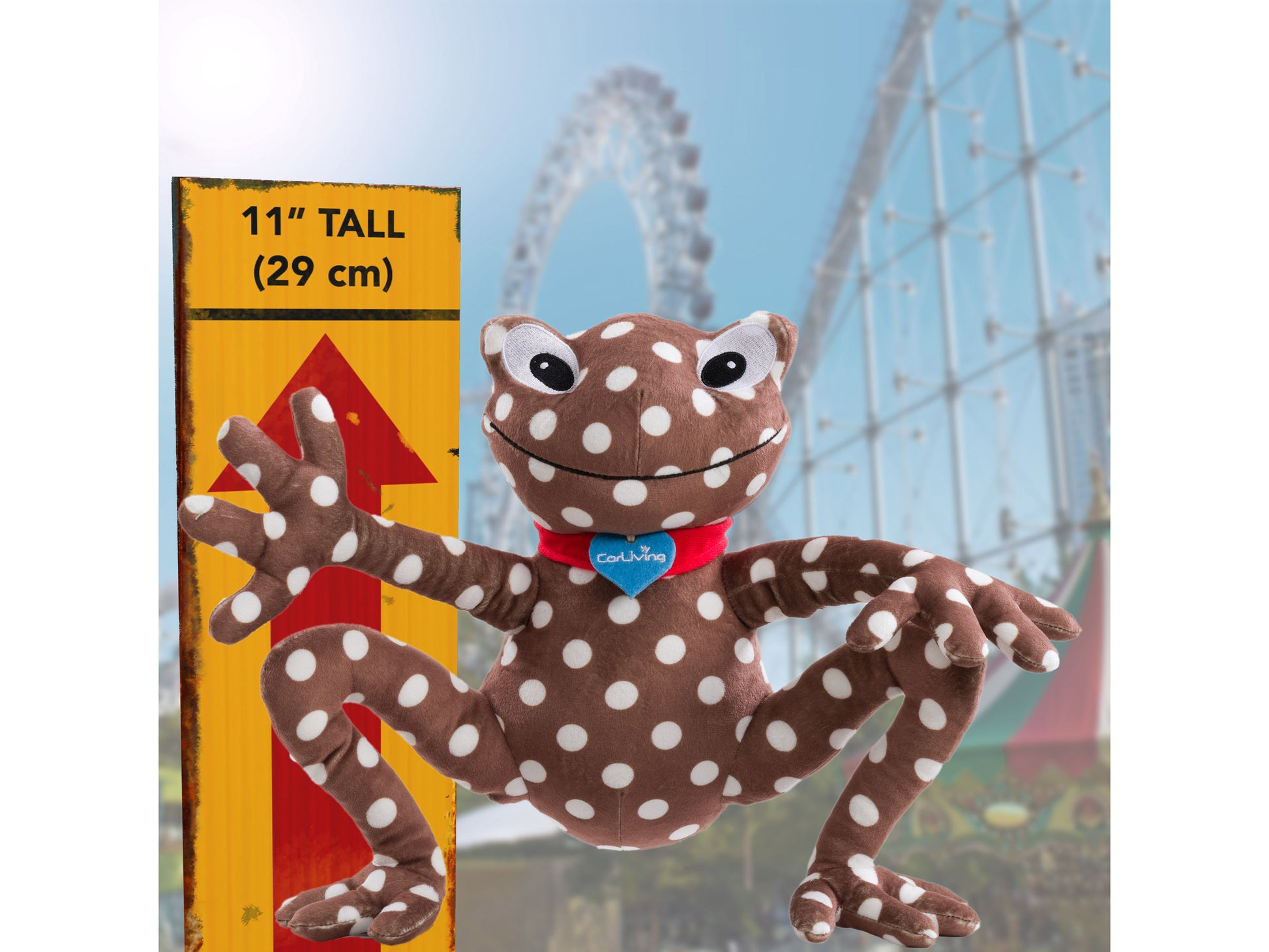 Green plush frog with a soft, velvety texture, large embroidered eyes, and a cheerful smile. The frog has a light green belly and is designed as a charity plush toy.