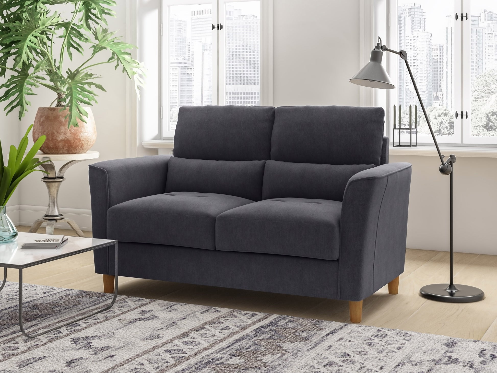 Gray 2-seater loveseat with plush cushions, wooden legs, and contemporary design. Upholstered in soft fabric, featuring clean lines and a minimalist aesthetic perfect for modern living rooms.