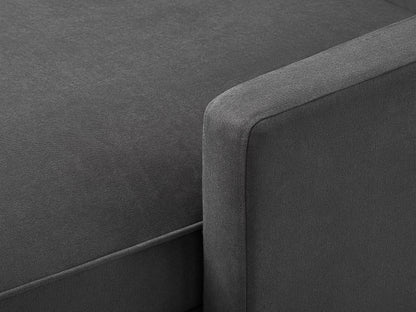 Gray reversible sectional sofa with chaise lounge, tufted cushions, and wooden legs. Modern design featuring soft fabric upholstery and spacious seating, perfect for living rooms or family spaces.