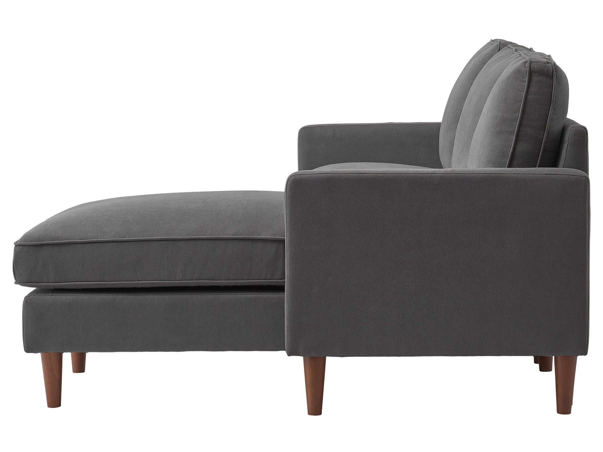 Reversible sectional sofa in light gray fabric with tufted cushions, chaise lounge, and wooden legs, perfect for modern living rooms, providing comfort and style with its versatile design and spacious seating.