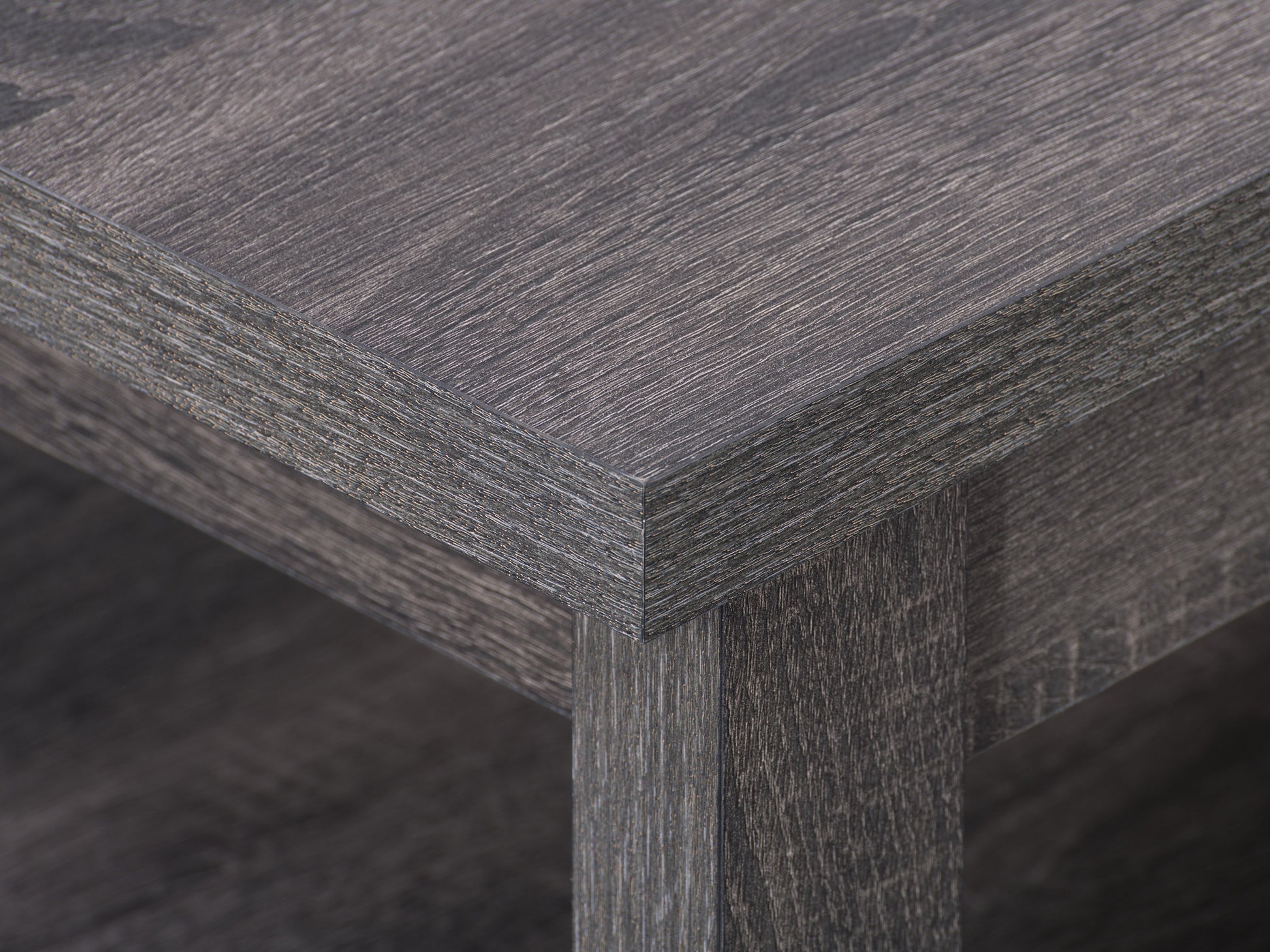 Modern minimalist wooden coffee table with a rectangular top, smooth light oak finish, and sturdy black metal legs, suitable for contemporary living rooms or office spaces.