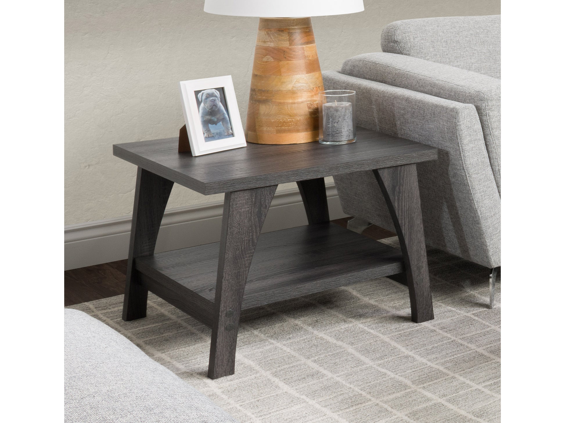Modern square end table with black metal frame, light wood top, and lower shelf, perfect for living rooms or bedrooms.