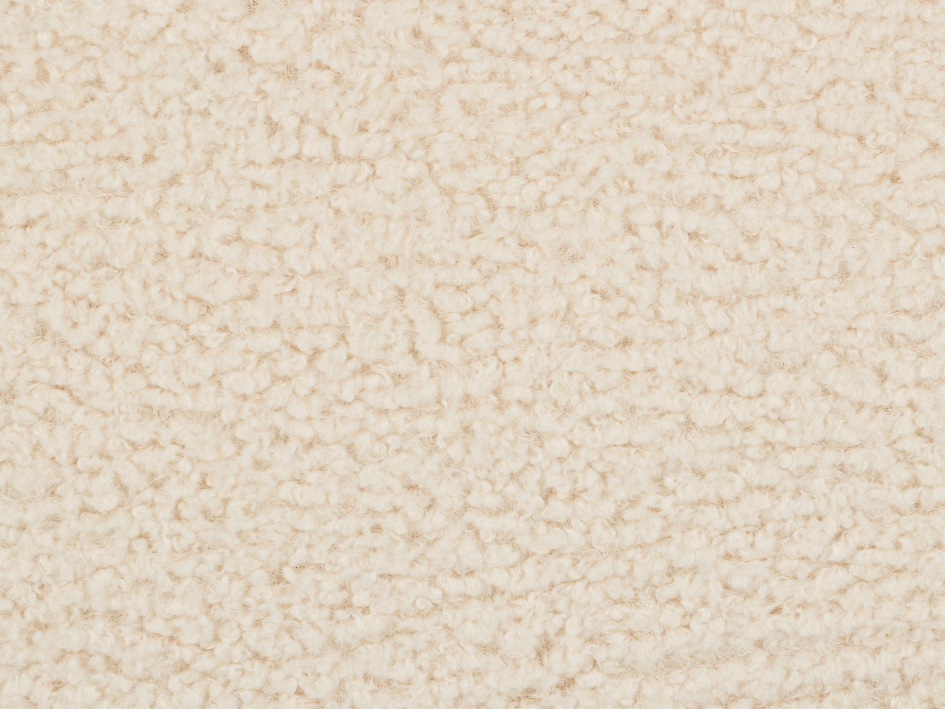 Cream boucle barrel accent chair with curved backrest, plush upholstery, and wooden legs. Modern design, cozy texture, and neutral color perfect for living room or bedroom decor.