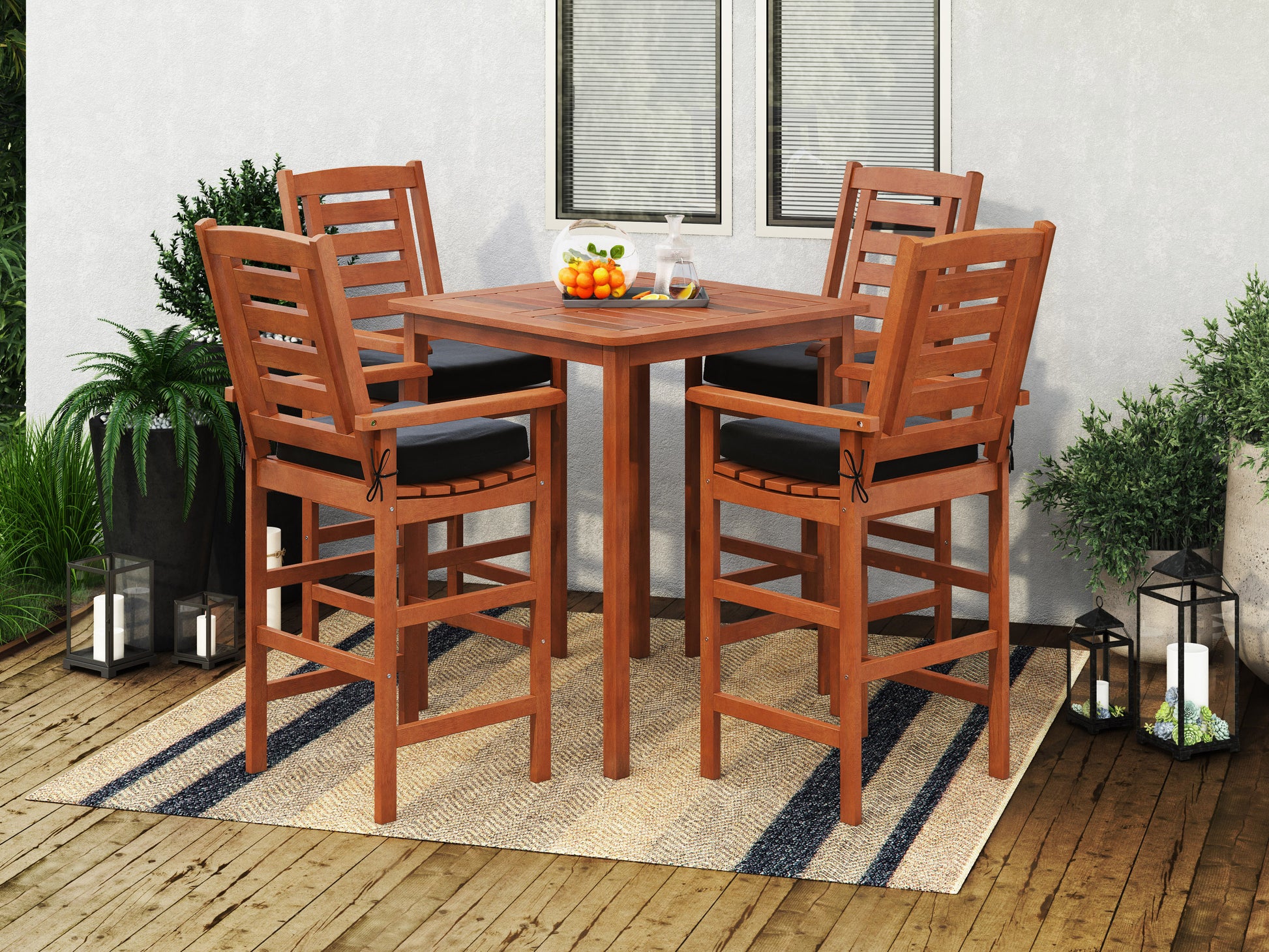 Outdoor patio bar set with gray wicker stools, beige cushions, and a rectangular glass-top bar table featuring a sturdy frame and built-in shelves, perfect for entertaining and outdoor gatherings.
