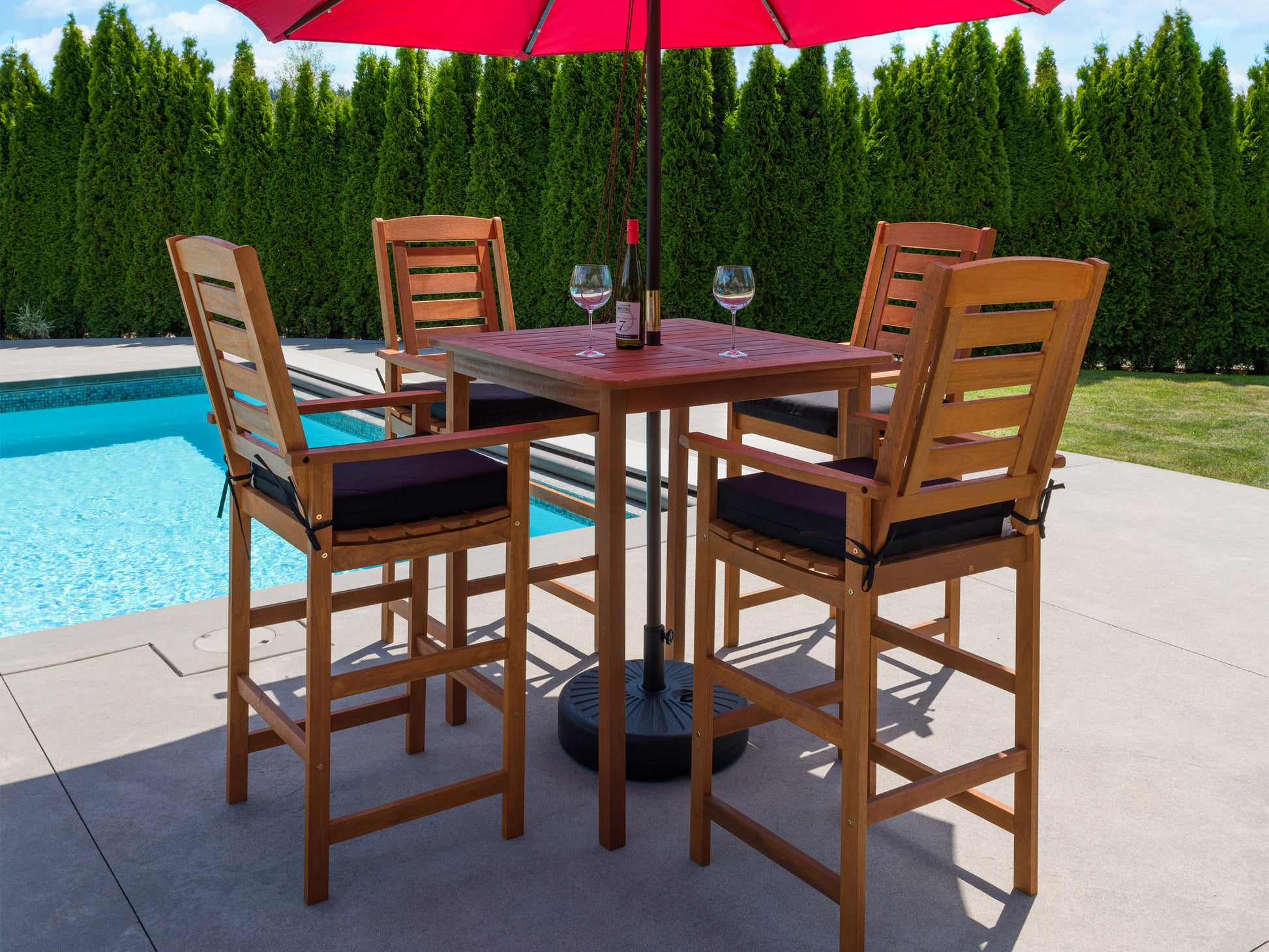 Modern patio bar set with four white cushioned stools and a grey rectangular high table, featuring a sleek, weather-resistant design. Ideal for outdoor dining and entertaining.