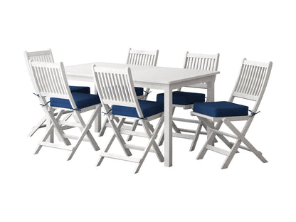 Black metal patio dining set with rectangular glass table and six matching chairs featuring beige cushions, suitable for outdoor use.
