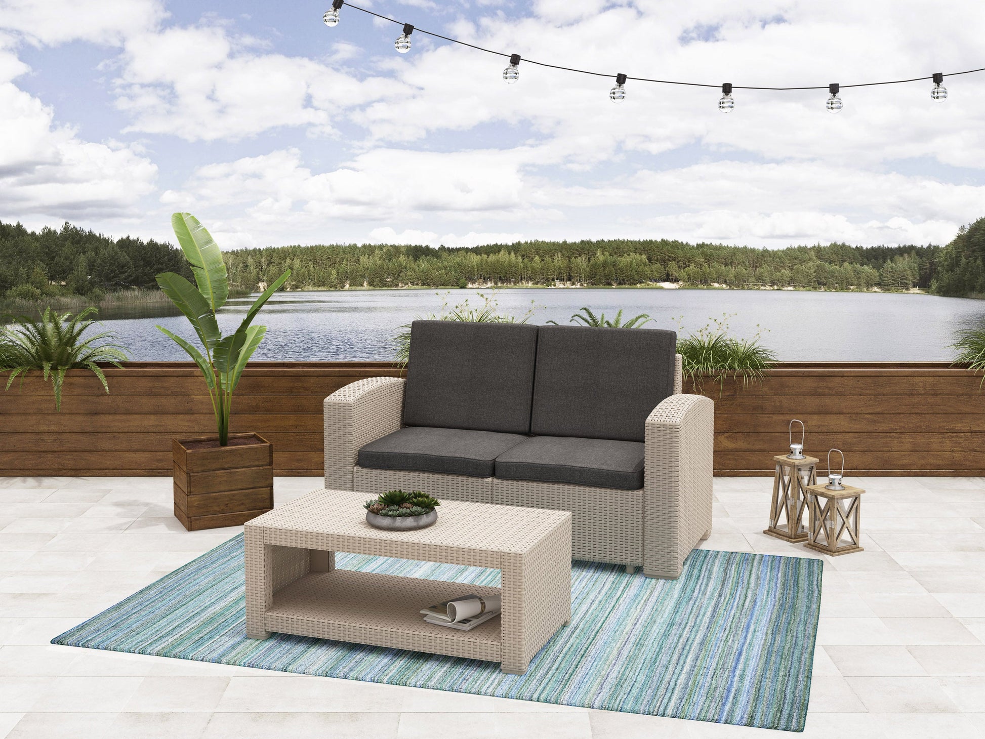 Outdoor patio conversation set with grey wicker, beige cushions, and a glass-top coffee table, designed for comfort and style in garden or backyard settings.