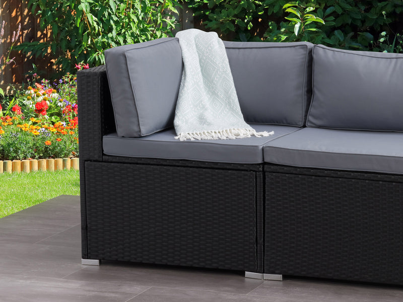 black and ash grey Outdoor Corner Chair Parksville Collection lifestyle scene by CorLiving