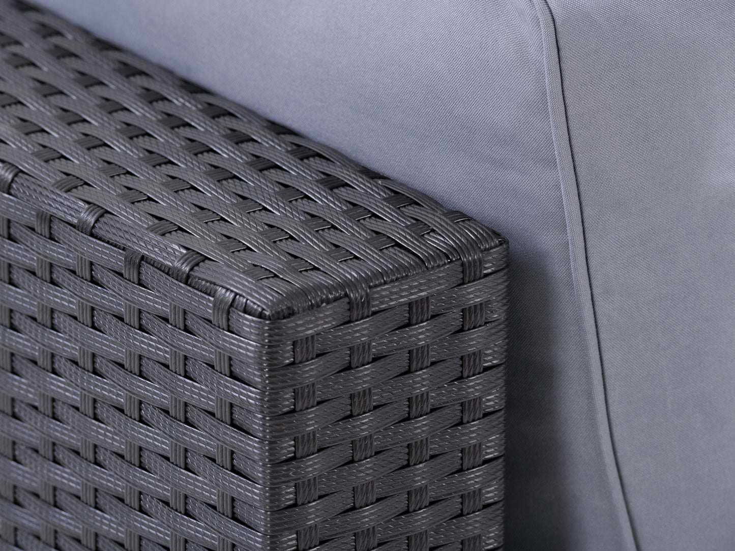 Outdoor loveseat with beige cushions and dark brown wicker frame, featuring a durable and weather-resistant design, perfect for patio seating.